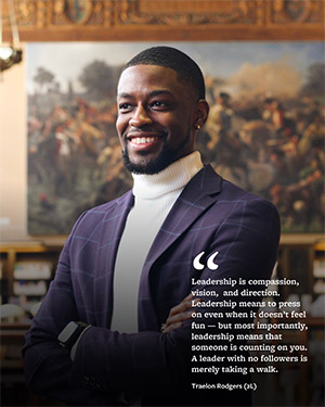 Clicking on the photo will redirect you to an Instagram post of Traelon's feature.
Traelon Rodgers smiling to his right side with arms crossed. Text overlaid on the photo says "Leadership is compassion, vision, and direction. Leadership means to press on even when it doesn’t feel fun — but most importantly, leadership means that someone is counting on you. A leader with no followers is merely taking a walk. Traelon Rodgers (2L). Links to Instagram post.